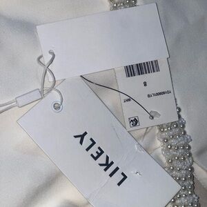 Likely White Beaded Women’s Dress